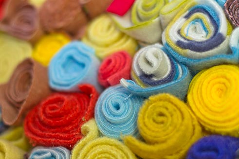 Product photography of wool items created by artist Caroline Mann at Allendale Forge.