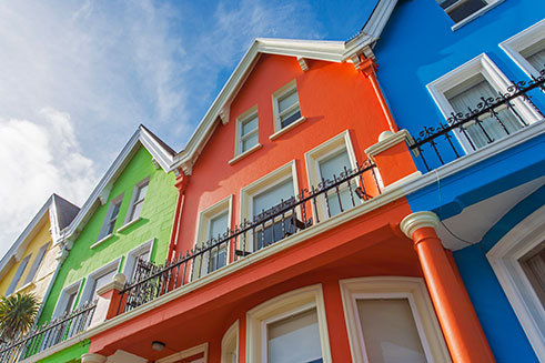 An architectural image of brightly-painted houses at Whitehead, in County Antrim, Northern Ireland. 