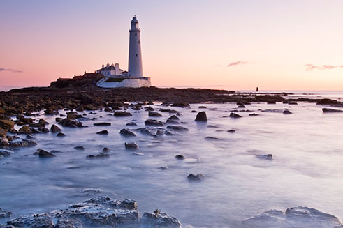 A photograph taken at sunrise of the lighthouse on St Mary’s Island, Whitley Bay, UK.