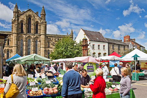 The ancient Market Square in Hexham on market day, photographed for the Hexham Community Partnership. 
