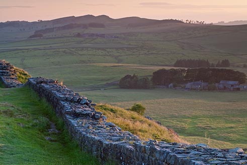 A tranquil image of Hadrian’s Wall at sunset, used to illustrate the Hands-on-Latin website. 
