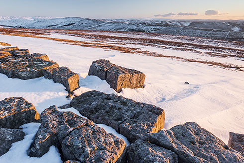 A photograph of Kevelin Moor in Northumberland, UK, with snow on the ground. 