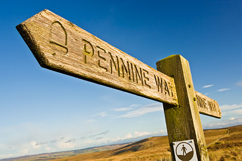 A finger-post indicating the route for a section of the Pennine Way in Northumberland. 